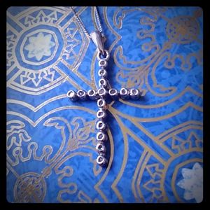 Sterling silver and diamond cross necklace